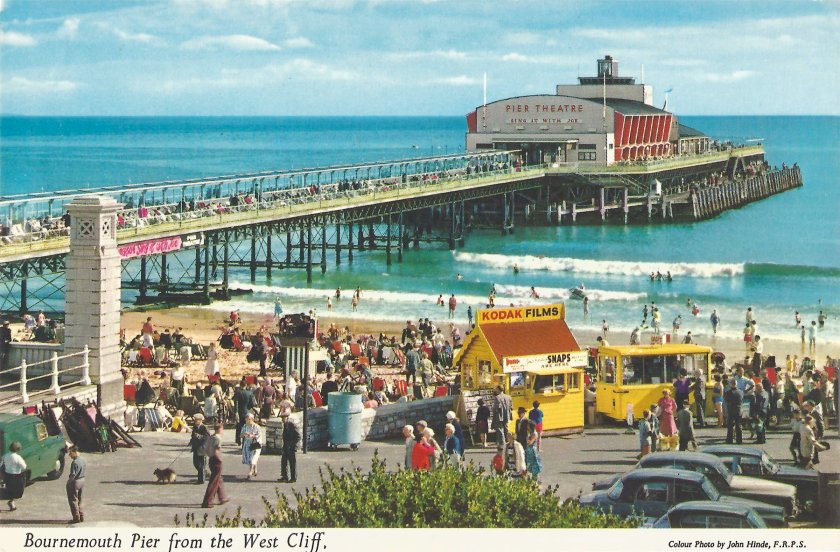 A postcard of Bournemouth pier showing the theatre at the end.